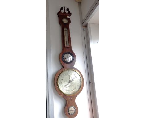 A WHEEL BAROMETER, BY J. GILARDI, BRISTOLmahogany cased,  silvered dial engraved with a scene, with convex mirror, thermomete