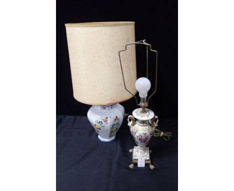 A QUIMPER POTTERY TABLE LAMP28cm plus fitting, and a continental porcelain lamp (2)Provenance: The Estate of the late Roger P