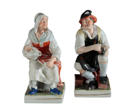 A PAIR OF MID 19TH CENTURY STAFFORDSHIRE POTTERY FIGURES, A COBBLER AND HIS WIFEmodelled seated on gilt banded square plinths