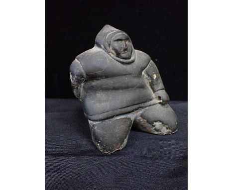 AN INUIT STONE CARVING OF A FISHERMAN12cm highProvenance: The Estate of the late Roger Peers (1932-2023), Curator of the Dors