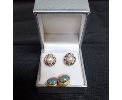 A PAIR OF FIRE OPAL AND UNMARKED YELLOW METAL EARRINGSand another unmarked pair with pearl centres