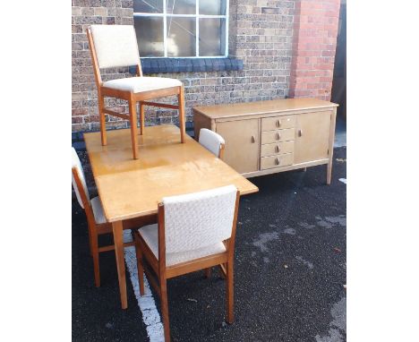 A GORDON RUSSELL OF BROADWAY LIGHT OAK DINING SUITEcomprising sideboard 140cm wide, extending table 78 x 153cm (open), and fo