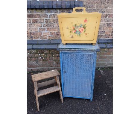 A BLUE LLOYD LOOM STYLE CUPBOARD(unlabelled), an old pine step, and a magazine rack (3)Provenance: The Estate of the late Rog