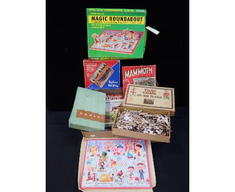 A GWR JIG-SAW PUZZLE 'THE CATHEDRAL'and other vintage puzzles, with a 'Magic Roundabout' Play Tray (the puzzles not checked f