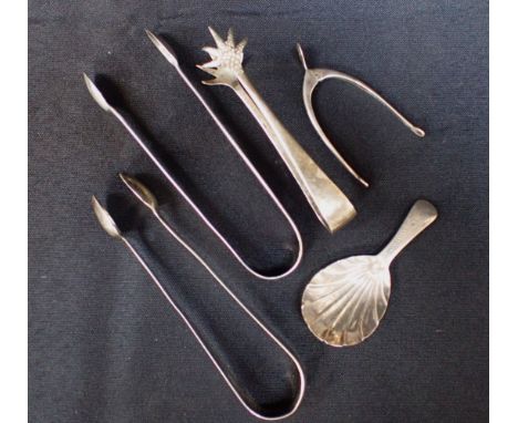 A PAIR OF SILVER NOVELTY 'WISHBONE' SUGAR TONGSother tongs and a caddy spoon