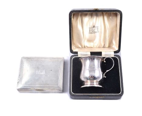 A silver Christening mug, William Suckling Ltd, Birmingham 1934, presentation inscription, 8cm, 1.6oz, cased; and a silver ci