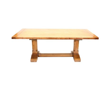 Light oak dining table, cleated ends, with a single additional end leaf, heavy trestle base with chamfered outlines, 264 x 10
