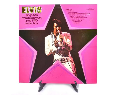 Elvis Presley, Elvis sings hits from his two movies, 12" vinyl, signed to the cover sleeve in blue biro 'Elvis Presley'.