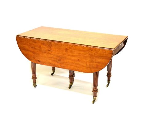 George III mahogany dining table, rectangular pull-out top, D-ends, reeded edge, turned fluted legs on castors, concertina ac