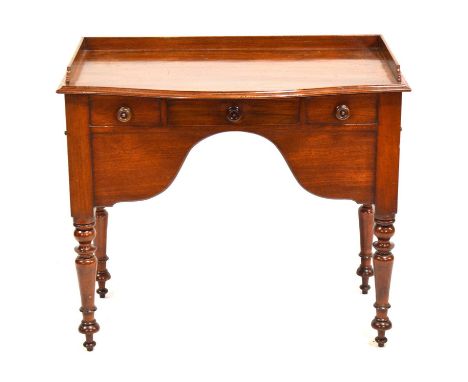 Victorian mahogany dressing table, with bow front, three-quarter gallery, fitted with a single frieze drawer and end cupboard