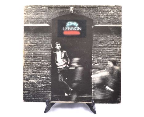 John Lennon, Rock 'n' Roll, 12" vinyl, signed in red biro to the sleeve cover.