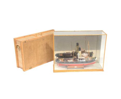 Scale model of a tugboat, small brass plaque engraved 'Tiger, John B Thorne, 1998', in a glass case, and also with a carry-ca