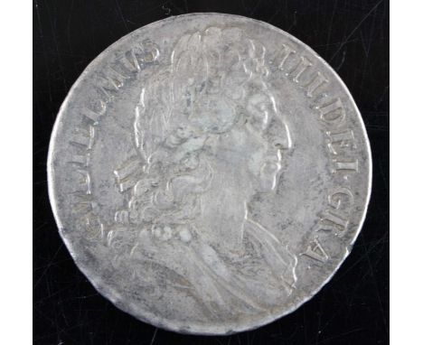 England, 1696 crown, obv: William III first laureate and draped bust right, legend around, rev: crowned cruciform shields aro