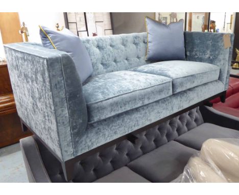SOFA, two seater, in a blush button back velvet, on ebonised square supports with two scatter cushions, 190cm L.
