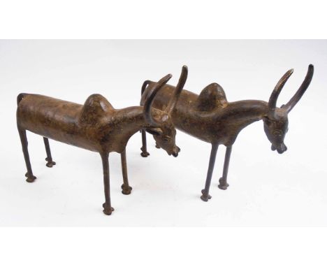 TRIBAL ARTS - BOBO BUFFALO BRONZE SCULPTURES, a pair, Burkina Faso, each 31cm nose to tail x 23cm H max. (2)