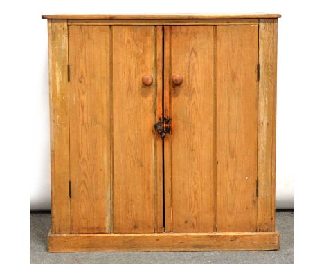 Victorian pine cupboard, two doors, plinth base, width 77cm, depth 45cm, height 77cm.Condition report:Colour variation, stain