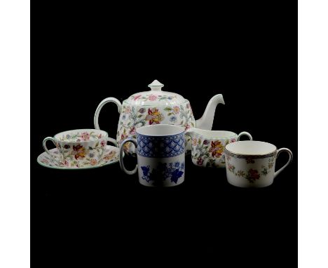 A Minton Haddon Hall part tea service, comprising teapot, milk jug, sandwich plate, other plates, cups and saucers; a Spode G