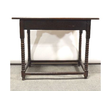 Old oak side table, two plank top, shaled frieze, bobbin-turned legs joined by rails, 91x52cm, height 71cm.