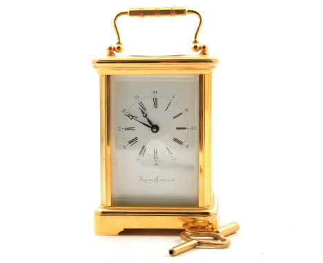 An Asprey &amp; Garrard brass cased carriage clock, 11 jewel movement, with key, 15cm including handle.Condition report:It is