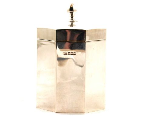 An octagonal silver cigarette box with gilded interior, Walker &amp; Hall, Sheffield 1938, 10cm, 5.2oz.Condition report:Shape