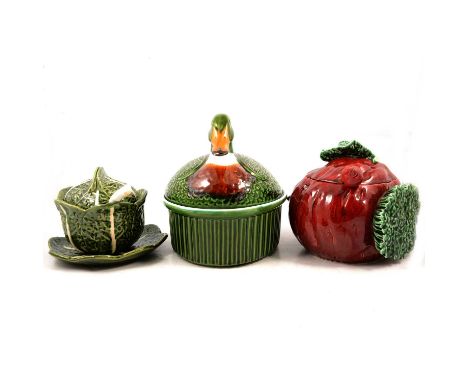 Four Portuguese ceramic vegetable-themed tureens with ladles and saucers; a small lidded red pepper design pot; a parsnip des