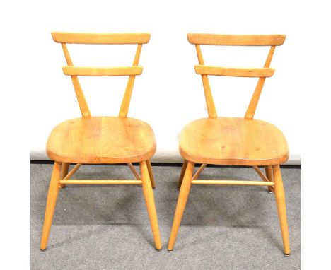 Pair of Ercol Red Spot child's chairs, ladder backs, splayed turned legs, width 37cm, height 66cm.Qty: 2