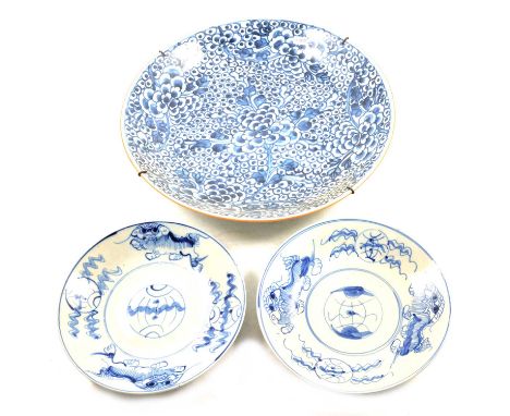 Asian blue and white charger, allover floral design, 37cm diameter; and a pair of Chinese plates, Temple Lion and lantern bor
