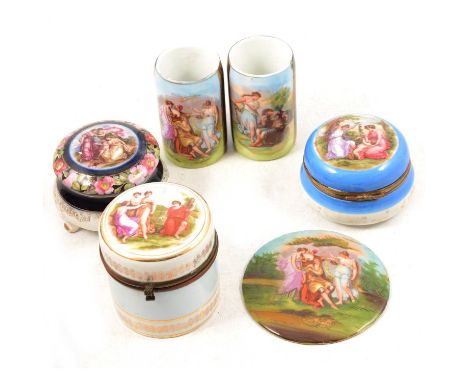 Collection of six Royal Vienna style trinket boxes, three circular plaques, pair of spill vases, and a miniature tankard.