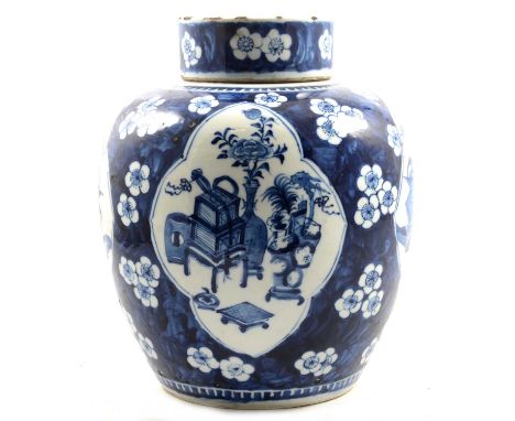 Chinese Prunus blossom ginger jar and cover, painted with lobed fields with scholar's tables and decorative items, four chara