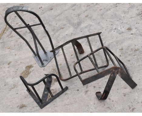 A collection of vintage metal saddle / bridle hangers of varying forms (4).  