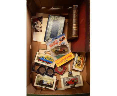 A mixed collection of items to include boxed Corgi Chitty Chitty Bang Bang TY87801, commemorative coins, boxed vehicles, Roya