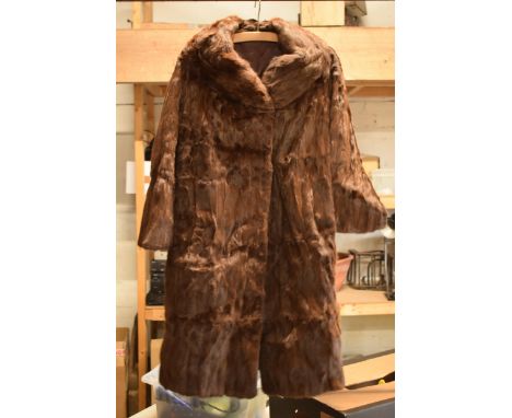 A trio of vintage fur coats of varying colours and sizes (3).  