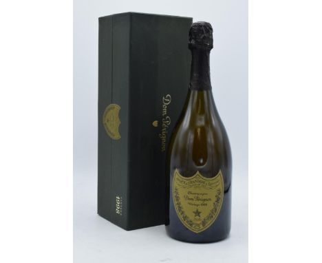 Boxed Dom Perignon Vintage 1998 Champagne 12.5%, 750ml.  Bottle still sealed. Box shows signs of faded / dirt.
