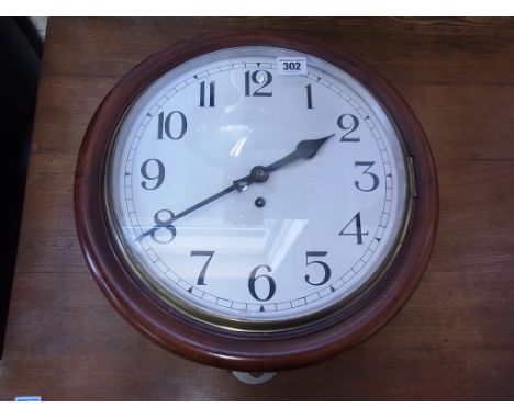 A mahogany cased wall clock with a chain driven fusee movement and painted Arabic numerals to white enamel dial, diameter 28c