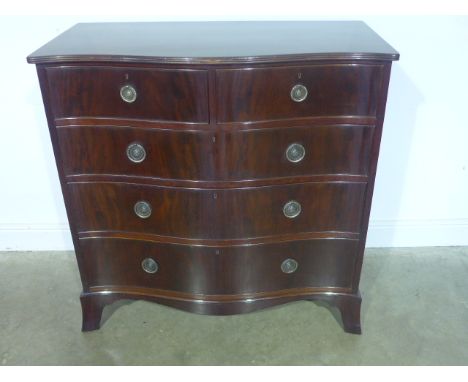 A restored Maple and Co mahogany serpentine chest with two short over three long drawers on splayed bracket feet - Height 107