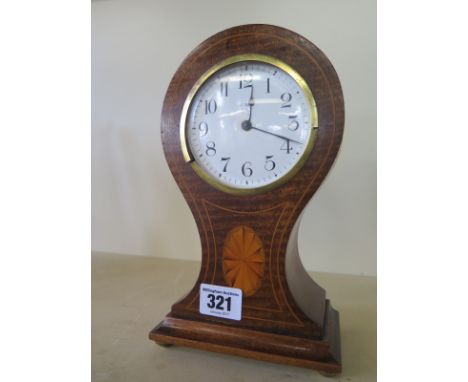 An Edwardian mahogany and inlaid balloon mantle clock