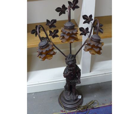 A modern three branch figural lamp - Height 85cm