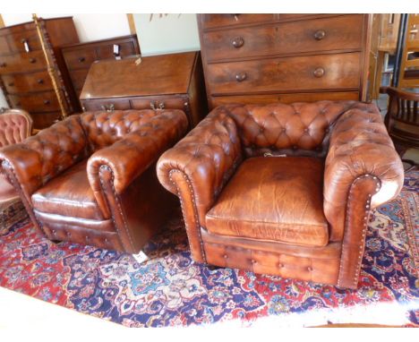 A pair of modern leather Victorian style Chesterfield button back armchairs- distressed condition with no major damage- W 100