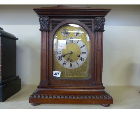 An oak eight day bracket clock with quarter chimes and strike on gong - 31cm x 20cm x 40cm 
