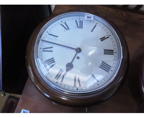 A mahogany cased wall clock, Roman numerals to white enamel dial - Diameter of 28cm to dial, 39cm to case