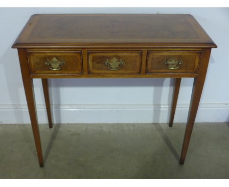 A new Georgian style hall table, walnut effect with three drawers, raised on slender tappering supports - 88cm x 42cm x 77cm 