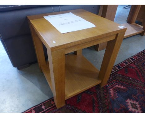 A small oak lamp table
