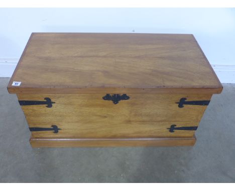A steel bound trunk with hinged lid - Height 43cm x 36cm x 43cm 