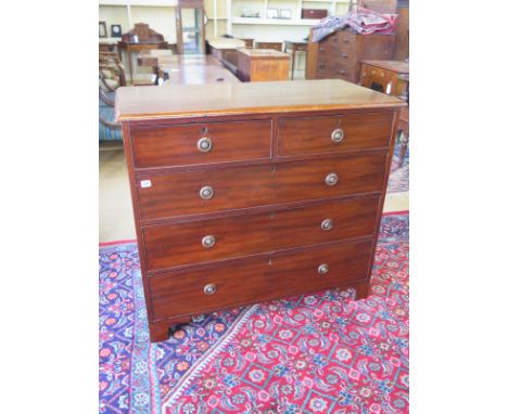 A Victorian mahogany 2 over 3 chest of drawers on bracket feet - Height 100cm x 107cm 
