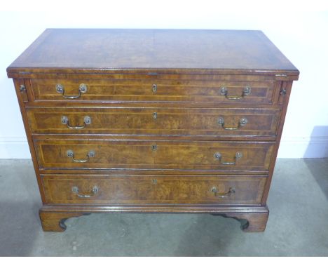 A new Georgian style walnut  Bachelors chest hinged top over four long graduated drawers, raised in bracket supports - 103cm 