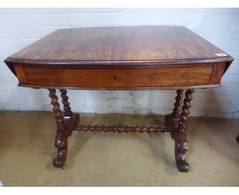 A 19th century mahogany oval shaped sofa table with a small drawer on sugar barley supports and stretcher - Height 72cm x 118