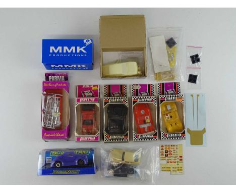 A quantity of 1:32 scale slot racing cars, bodies, kits and accessories by various manufacturers - G/VG in G boxes/packets wh