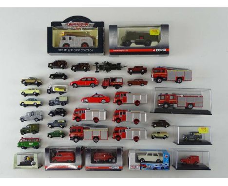 A mixed group of boxed and unboxed diecast vehicles by CORGI and others to include a selection of fire engines - mostly in 1: