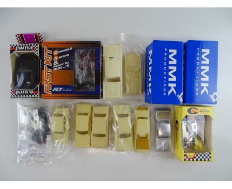 A quantity of 1:32 scale slot racing cars, bodies, kits and accessories by various manufacturers - G/VG in G boxes/packets wh