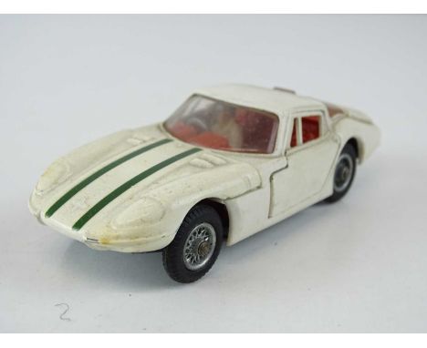 A CORGI 324 Marcos 1800 GT in white with green stripes - G in G/VG box